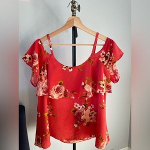 Orange flowy bare shoulder top with floral